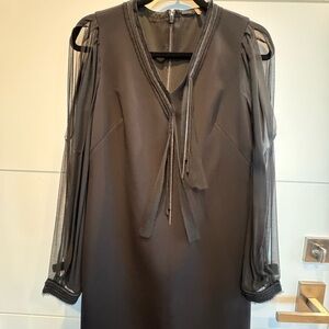 LBD by Elie Tahair. Sheer Sleeves and great metal details. Amazing on!